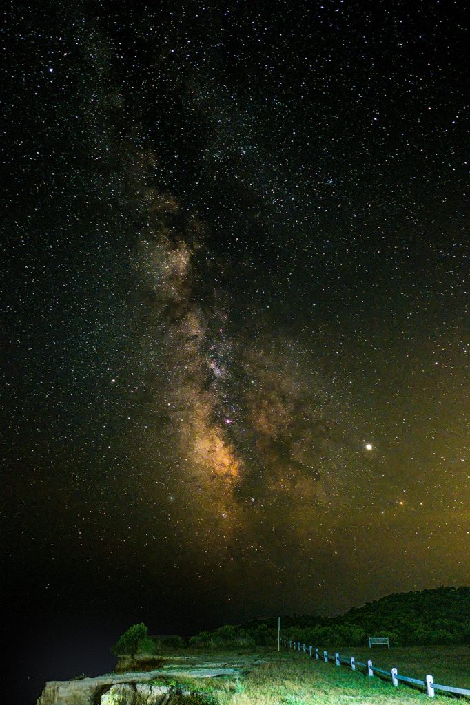 The Milky Way comes up over the bluffs of Montauk Point