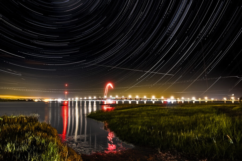 Star trails over the Ponquogue Bridge